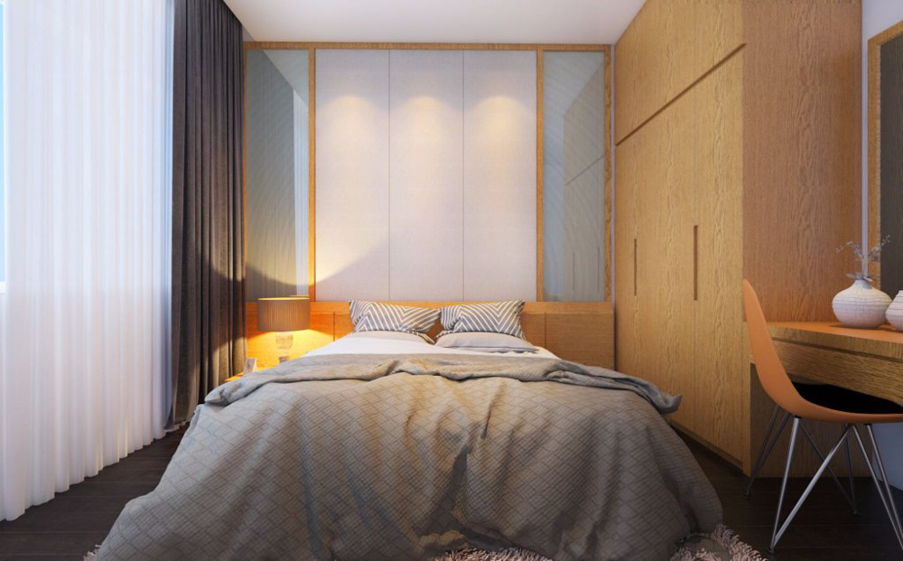 Phòng ngủ sử dụng hệ tủ lớn và gương tạo cảm giác rộng rãi